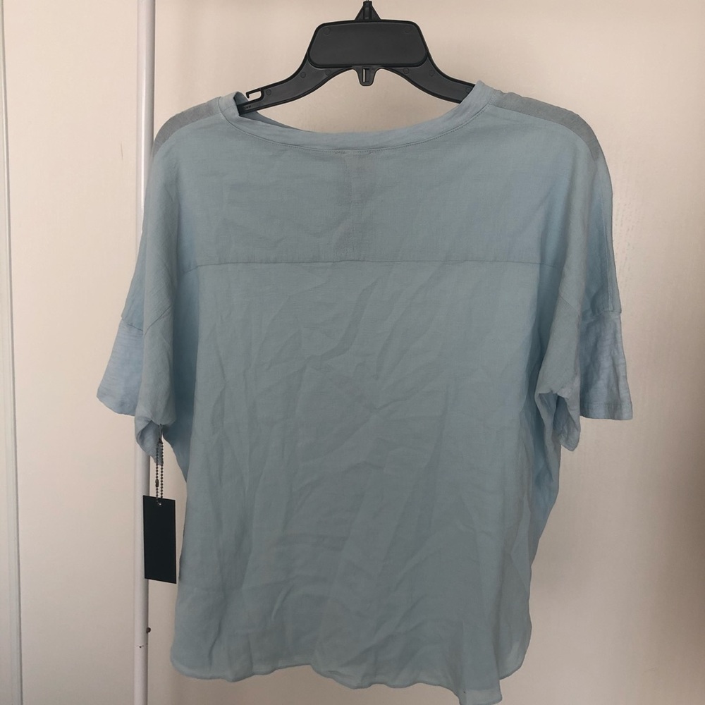 Light blue top